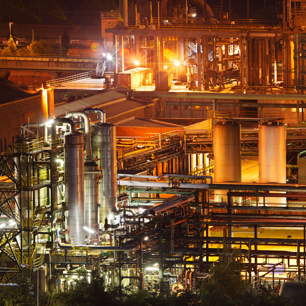 Transforming Communities Worldwide industry at night sj9sn2u